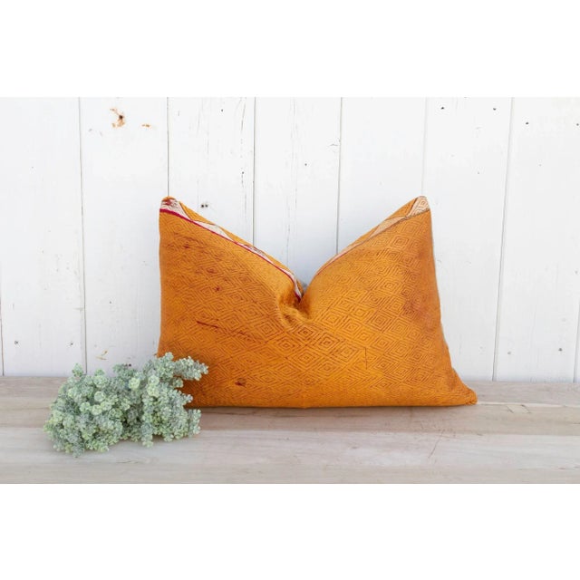 This luxurious Bagh Phulkari pillow features beautiful fine silk embroidery with a diamond pattern on a cotton fabric....