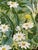 This vintage 1970s Riverdale screenprint floral cotton fabric features a charming green and white floral pattern, perfect...
