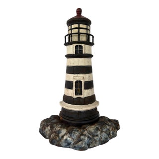 Vintage Cast Iron Lighthouse Doorstop in Black & White — Two-Piece Nautical Decor For Sale