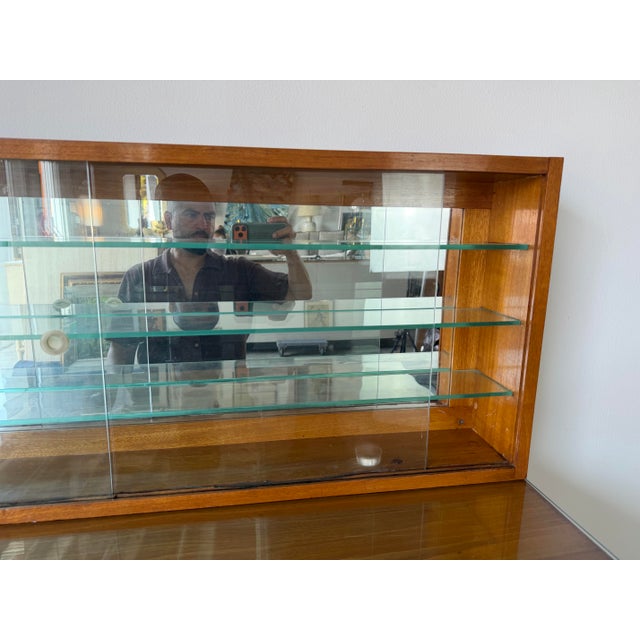1950’s Mid-Century Modern Solid Wood Desk With Glass Top and Wall Mounted Display Shelf For Sale - Image 10 of 12