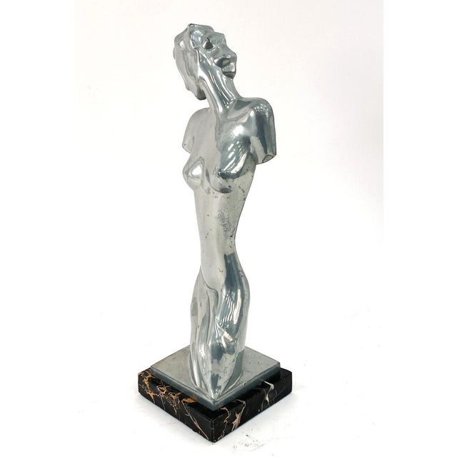 Fantastic art deco "Oscaresque" cast aluminum sculpture of a female nude. A very tasteful rendition of the female figure...