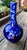 A beautiful vintage Fukagawa porcelain vase from Arita, Japan, showcasing the maker's celebrated cobalt blue glaze adorned...
