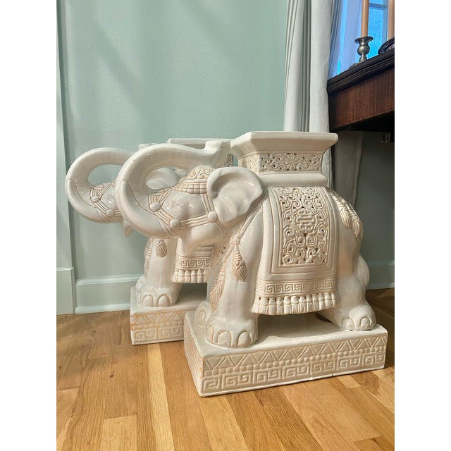 What could be better than an extra large ( 21.5”h )vintage ceramic elephant stool? A pair! This pair came from the home of...