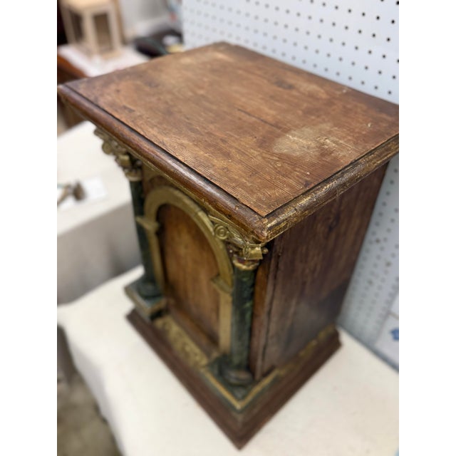 Antique Continental hand carved wood cabinet with single door egg and dart cornice and base.