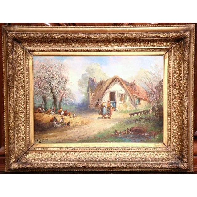 This bucolic, antique oil on canvas was painted in France circa 1860. Set inside a gilt frame, the painting depicts a...