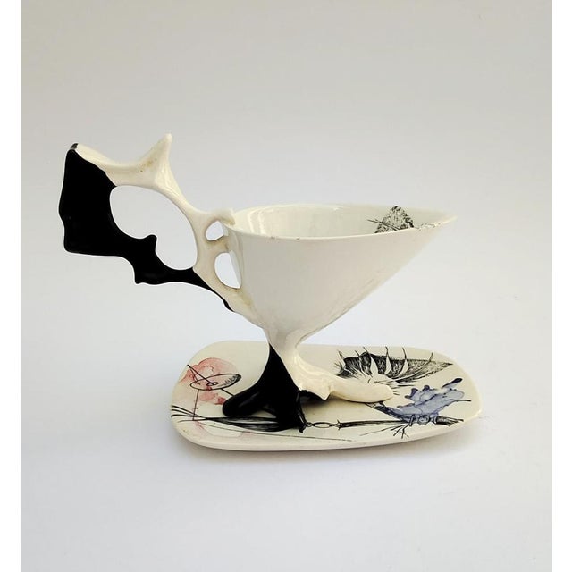 Stunning ceramic teacup and saucer Designed by Antonia Campi for Lavenia Marked at the base of both pieces, with the C73...