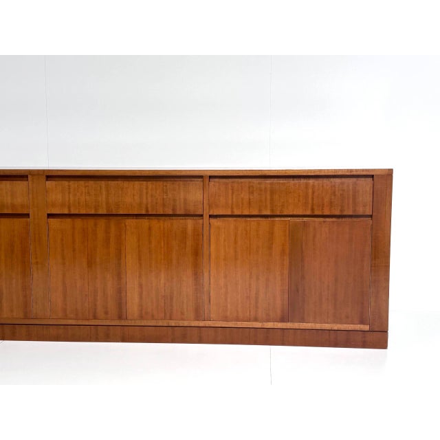 A very generously sized, elegantly proportioned vintage sideboard in the mid-century style, dating from the 1960s. The...