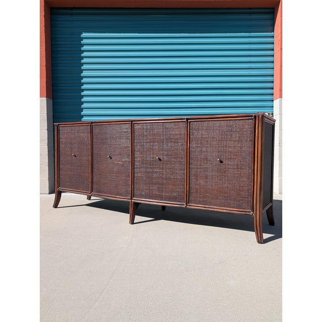 A refined and architecturally elegant sideboard / buffet designed by Barbara Barry for Baker / McGuire, exemplifying the...