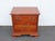 This classic Nightstand is made of wood, solid cherry, and metal. The End Table was made by Tell City Chair Company, Dowry...
