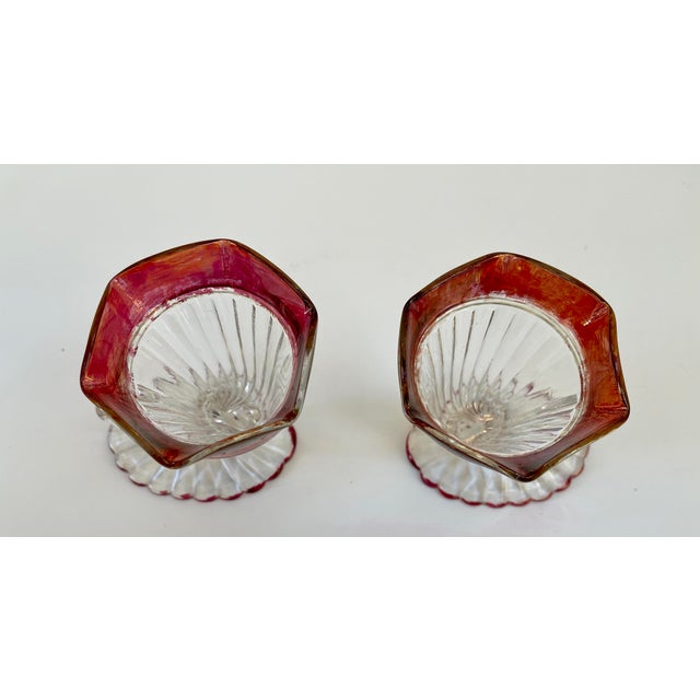 Lovely pair of red cranberry beautifully decorated cornucopia vases. Perfect for tabletop display for your fresh flowers...