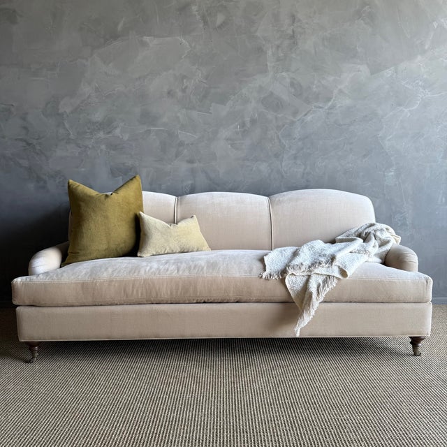 This beautiful english arm sofa has a modern twist, with its single bench cushion, and beautiful curved apron sides. It’s...